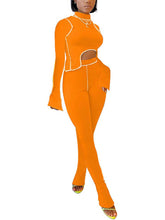 Zweiteiliges Cutout-Oberteil, figurbetonte lange Hose